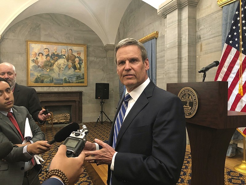 In this April 25, 2019, file photo, Republican Tennessee Gov. Bill Lee talks to reporters at the Capitol in Nashville, Tenn. More than half of Lee's newly appointed cabinet members, including his education czar and Tennessee's Medicaid chief, didn't submit applications or provide any documents outlining why they deserved the jobs he gave them. The Associated Press reviewed all applications submitted to Lee's office during his transition into the top statewide position. This included submissions for both cabinet spots and lower level jobs inside the executive branch. (AP Photo/Kimberlee Kruesi, File)