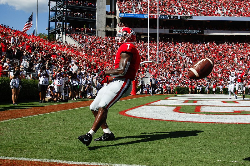 Georgia football players, such as tailback D'Andre Swift, could soon be celebrating touchdowns on Dooley Field at Sanford Stadium.