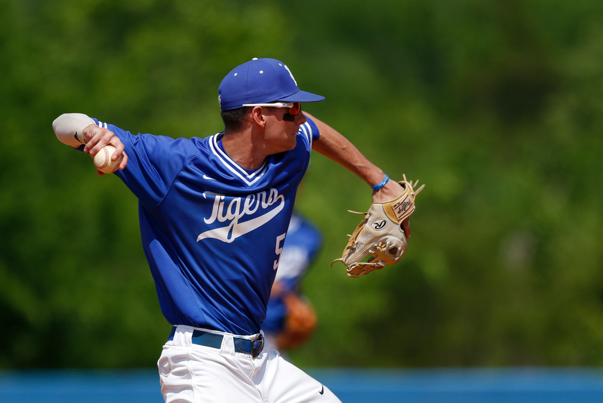Ringgold shortstop Brayden Broome makes a throw to first during the continuation of the Tigers' lightning-delayed game against Hart County at Ringgold High School on Thursday, May 2, 2019, in Ringgold, Ga.