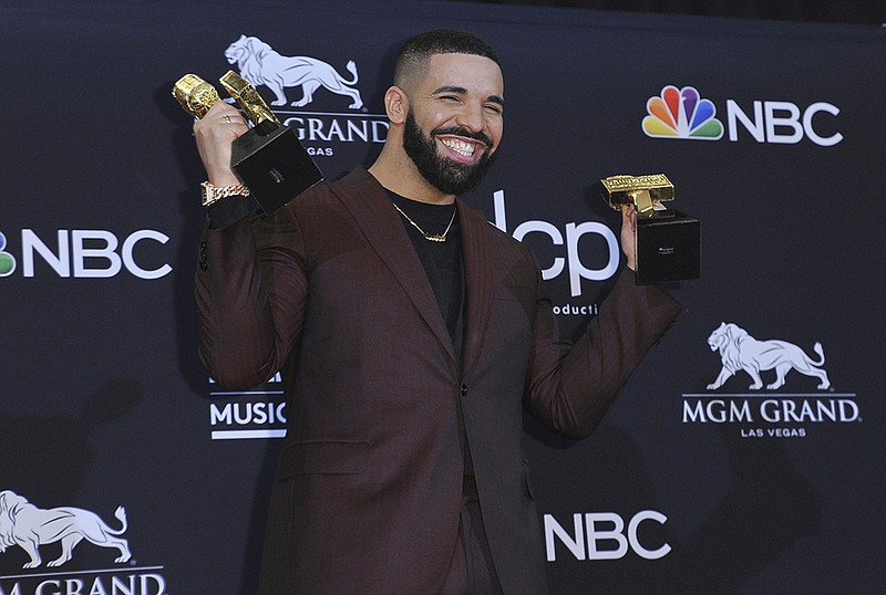 Drake poses in the press room with his awards at the Billboard Music Awards on Wednesday, May 1, 2019, at the MGM Grand Garden Arena in Las Vegas. Drake won for top artist, top male artist, top billboard 200 artist, top hot 100 artist, top streaming songs artist, top song sales artist, top radio songs artist, top rap artist, top rap male artist, top billboard 200 album and top rap album for "Scorpion," and top streaming song video for "In My Feelings."(Photo by Richard Shotwell/Invision/AP)