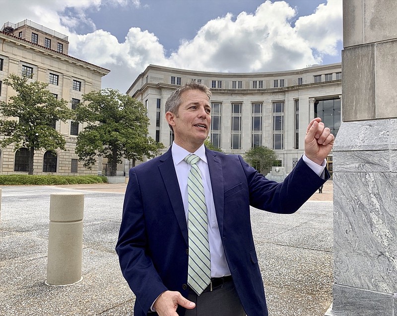 Former Alabama legislator Ed Henry smiles as he speaks with reporters on Thursday, May 2, 2019 outside the federal courthouse in Montgomery, Ala. A federal judge has sentenced Henry to two years of probation for his role in a health care fraud case. (AP Photo/Kim Chandler)

