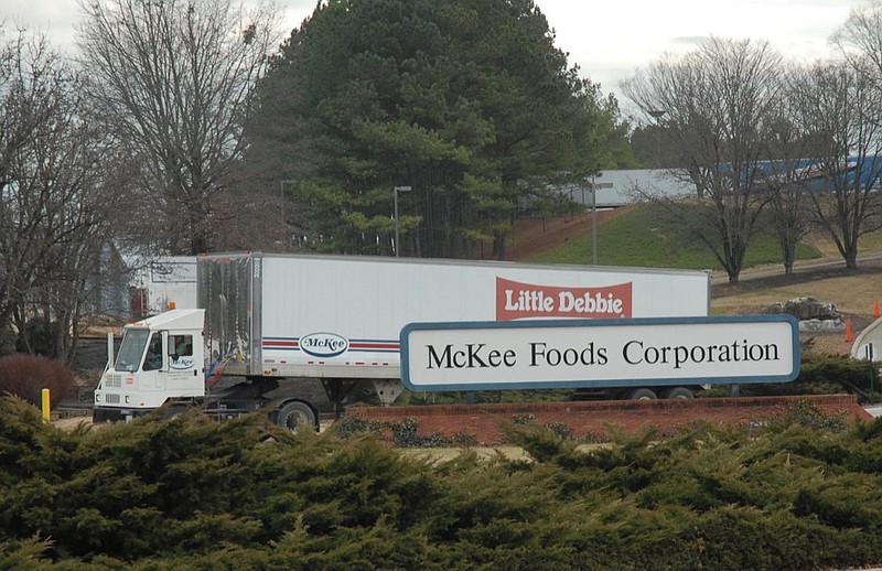 Staff photo by Tim Barber/Chattanooga Times Free Press - A short-haul tractor moves a McKee Foods trailer to another loading site at the Collegedale business on Wednesday. 