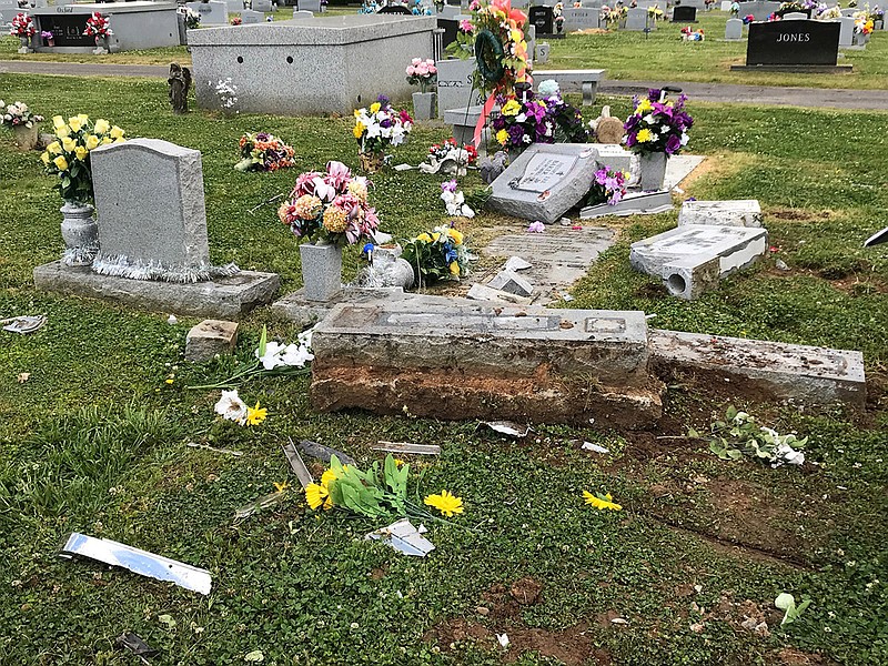 A car left the roadway and damaged graves on May 3, 2019, in West Hill Cemetery cemetery in Dalton, Georgia. The driver was charged with DUI. / Photo from the Dalton Police Department
