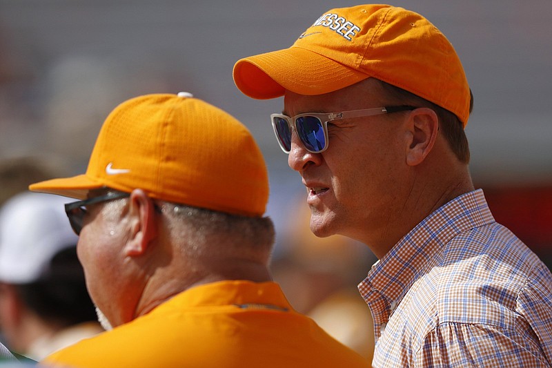 Former University of Tennessee and NFL quarterback Peyton Manning, right, and former tennis star Andy Roddick, not pictured, are among the new co-owners of Sweetens Cove Golf Course in South Pittsburg.