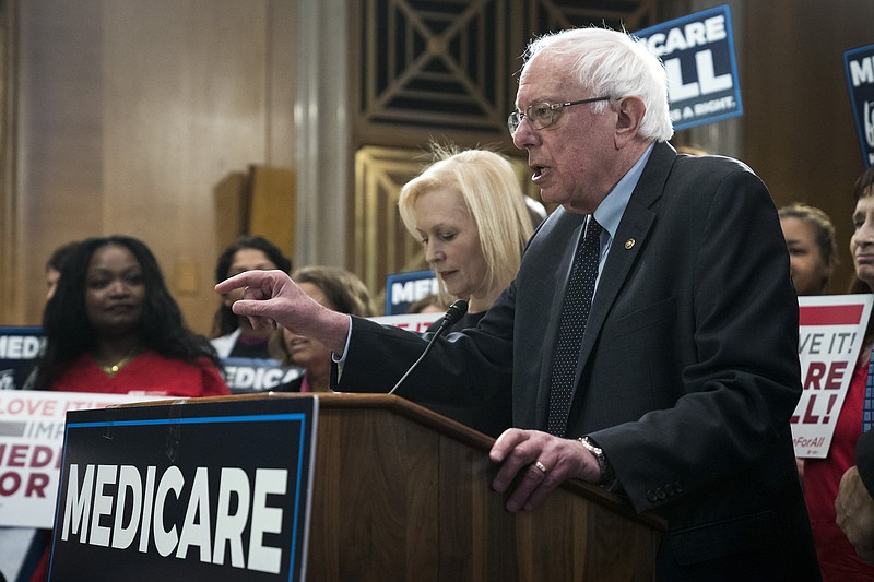 Sen. Bernie Sanders of Vermoney speaks alongside Sen. Kirsten Gillibrand of New York at a news conference reintroducing Sanders' Medicare for All Act on Capitol Hill in Washington on April 10, 2019. (Sarah Silbiger/The New York Times)