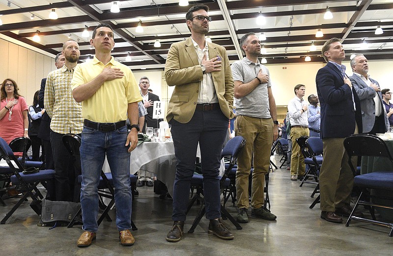 Attendees say the Pledge of Allegiance as it is lead by Colonel Jeff Sims.  The 41st annual Chattanooga Area Leadership Prayer Breakfast was held at the Chattanooga Convention Center on May 7, 2019.