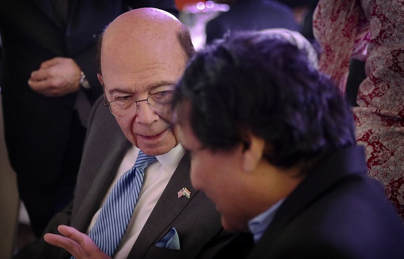 Indian Commerce Minister Suresh Prabhu, right talks with US commerce secretary Wilbur Ross during the 11th Trade Winds Business Forum and Mission hosted by the US Department of Commerce, in New Delhi, India, Tuesday, May 7, 2019. Top executives of more than 100 U.S. companies are visiting India to meet with government leaders, market experts and potential business partners to boost reciprocal trade.(AP Photo/Manish Swarup)


