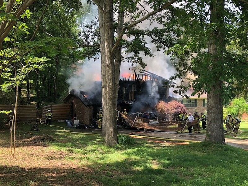Firefighters battled a garage fire in the 700 block of Stonecrest Circle on Tuesday, May 7, 2019. The East Brainerd area home was considered to be a total loss. / Photo provided by Amy Maxwell with Hamilton County Emergency Services 