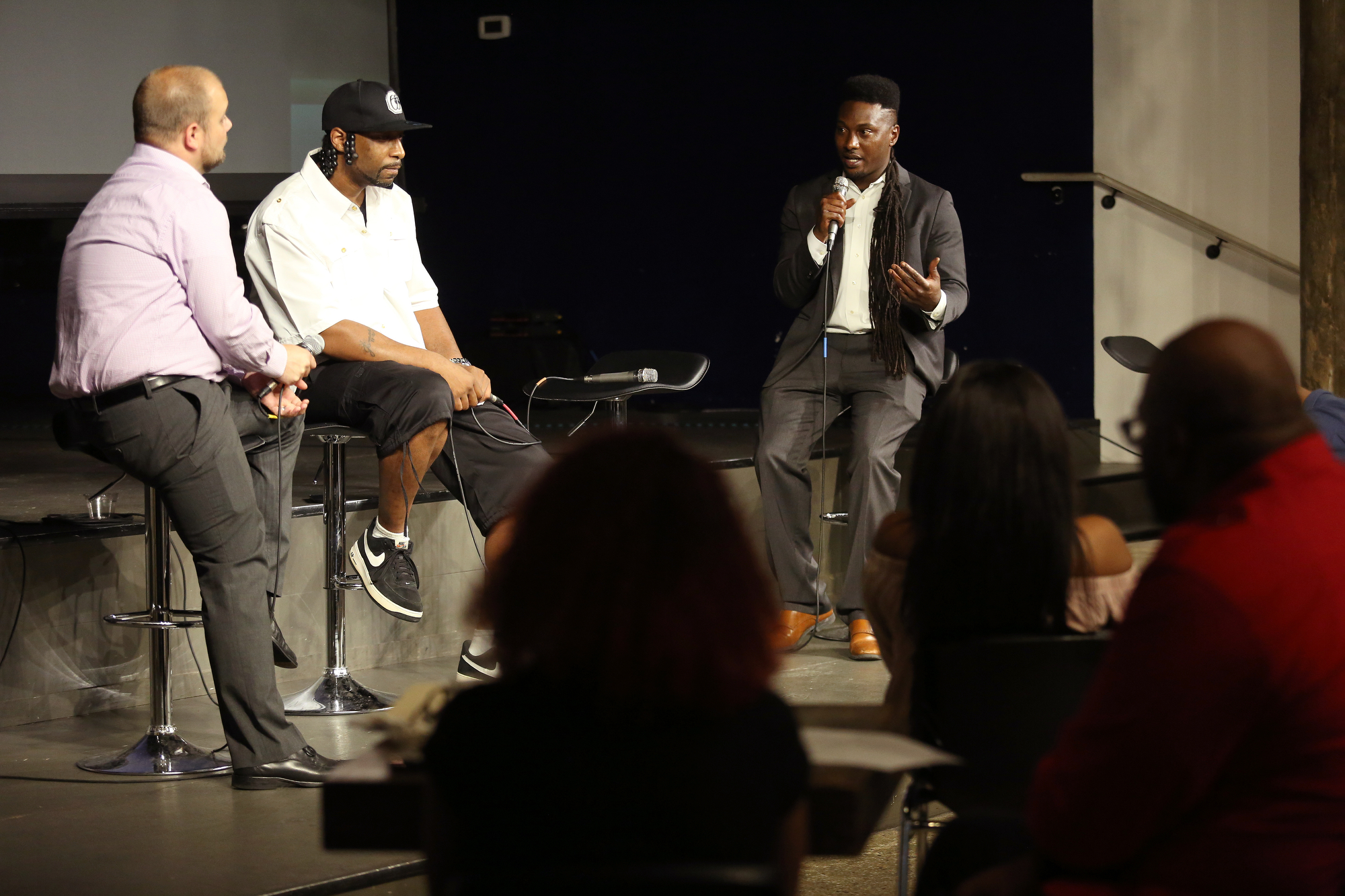 Second from left, Jamaal Hicks of Pimpoholic Films and to his right, Maurice McDowell Jr. of Lil Mo Films, talk about the production of their documentary "32" during a viewing and panel discussion at Camp House Thursday, May 9, 2019 in Chattanooga, Tennessee. The documentary is about a 32-man federal roundup that occurred in 2013 in which 32 black males were arrested and primarily charged with drug-related offenses.