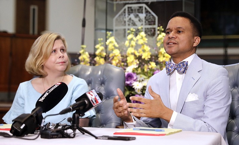 FILE - In an April 3, 2019 file photo, Pastor Furman Fordham, right, speaks on behalf of death row inmate Don Johnson, in Nashville, Tenn. Supporters of Johnson are appealing to Gov. Bill Lee's strong Christian faith in requesting clemency for Johnson, who they say was redeemed by Jesus. At left is Kelley Henry, an assistant federal public defender. (AP Photo/Mark Humphrey, File)

