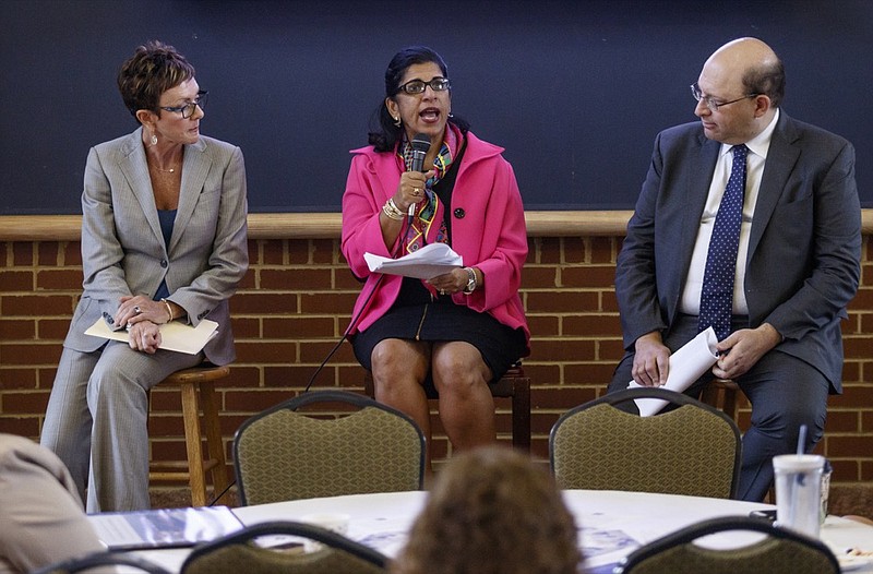 Staff photo by Doug Strickland / 
Kim White with River City Company, left, Sheila Boyington with Thinking Media, center, and David Eichenthal with the PFM Group sit on a panel to discuss a Hamilton County Schools budget suggestion plan drafted by members of the Chattanooga Area Chamber of Commerce during a chamber meeting at Bessie Smith Cultural Center on Thursday, Aug. 3, 2017, in Chattanooga, Tenn. The plan offered suggestions for budget consolidation and improvements in efficiency.