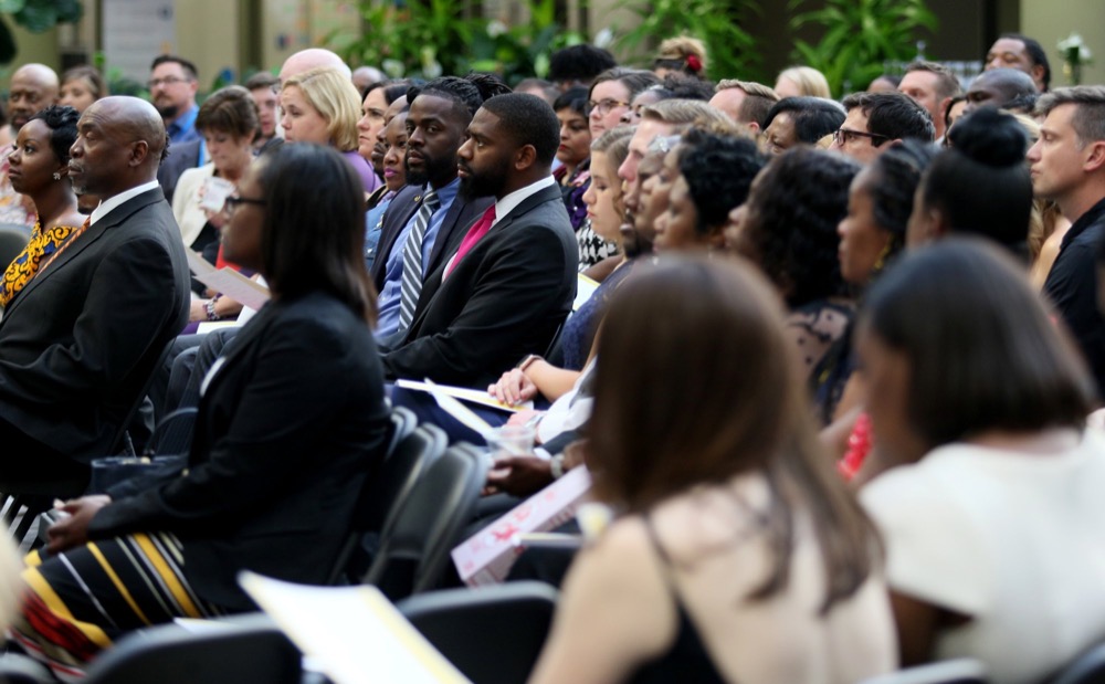 Guests listen as teachers are honored during the OZcars Gala Friday, May 10, 2019 at Unum in Chattanooga, Tennessee. The event was held for the Opportunity Zone schools in Hamilton County to celebrate educators who have gone above and beyond to help students succeed.
