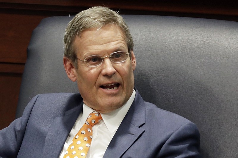 FILE - In this April 17, 2019, file photo, Tennessee Gov. Bill Lee takes part in a discussion on state-level criminal justice reform in Nashville, Tenn. Lee plans to let legislation to allow sports betting become law without his signature, putting a state that has largely shied from expanding gambling in position to become the first to offer an online-only sportsbook. (AP Photo/Mark Humphrey, File)

