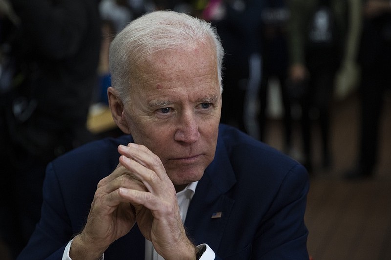 Former vice president and Democratic presidential candidate Joe Biden listens to a patron at a Mexican restaurant Wednesday, May 8, 2019, in Los Angeles. (AP Photo/Jae C. Hong)