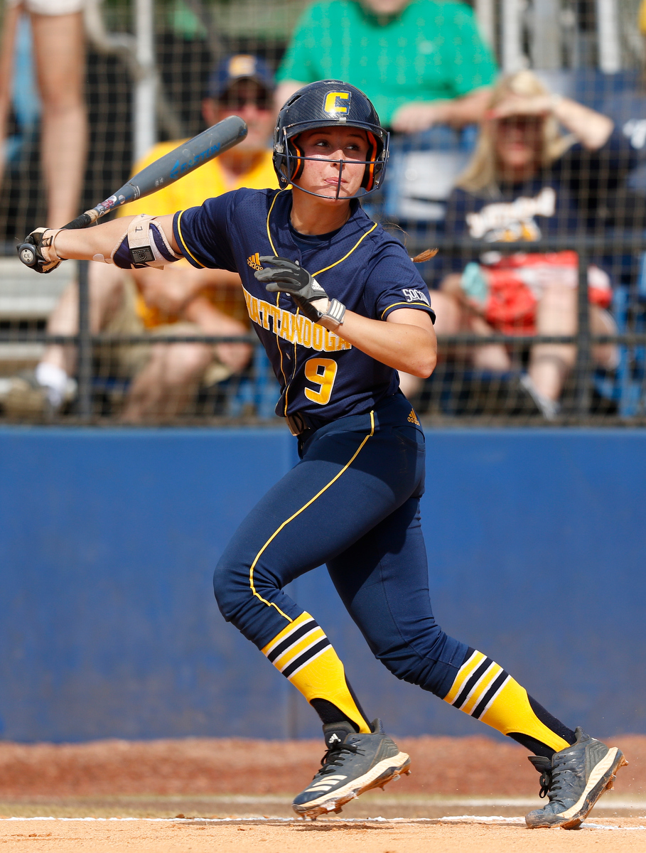 UTC leadoff hitter Emily Coltharp bats against UNC Greensboro during the first game of the SoCon tournament finals.