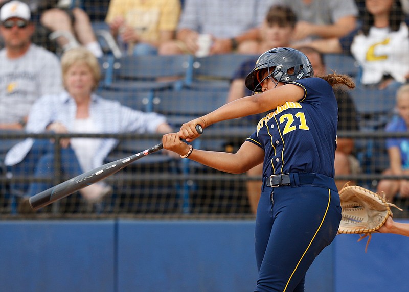 UTC's Cameren Swafford hits an RBI double against UNCG during the first game of the SoCon tournament's championship round Saturday at Frost Stadium.