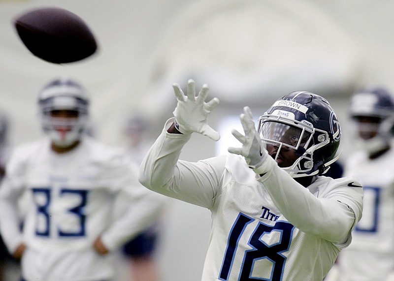 Tennessee Titans wide receiver A.J. Brown makes a catch during the team's rookie minicamp session Saturday in Nashville.