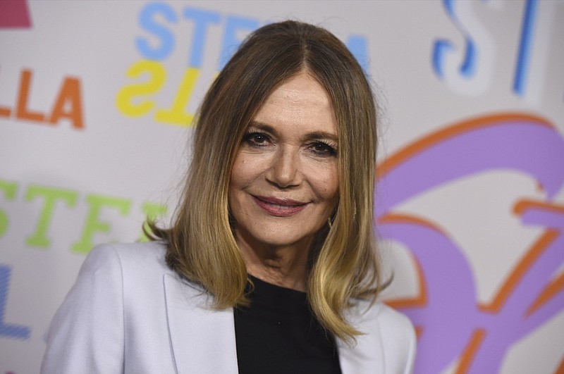 In this Jan. 16, 2018 file photo, Peggy Lipton arrives at the Stella McCartney Autumn 2018 Presentation in Los Angeles. Lipton, a star of the groundbreaking late 1960s TV show "The Mod Squad" and the 1990s show "Twin Peaks," has died of cancer at age 72. Lipton's daughters Rashida and Kidada Jones say in a statement that Lipton died Saturday, May 11, 2019, surrounded by her family. (Photo by Jordan Strauss/Invision/AP, File)