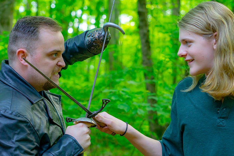 James Reed plays Captain Hook and Jeremiah Rapier is Peter Pan. / Back Alley Productions Photo