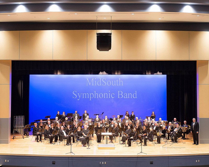 Jim Souders, standing right, conducts the MidSouth Symphonic Band. / MidSouth Band Contributed Photo