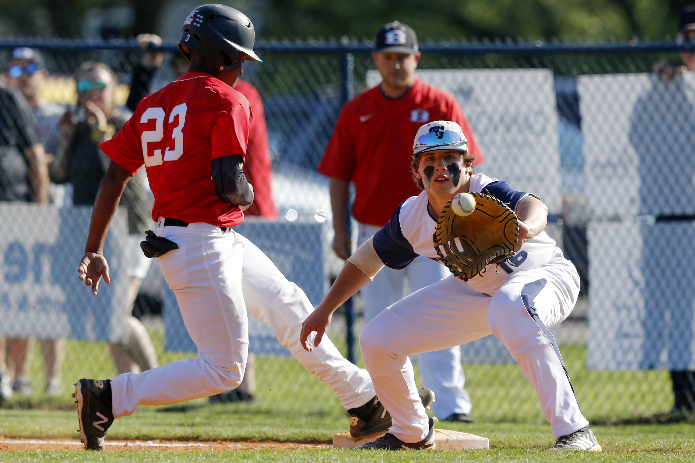 Bowdon's Jaylen Baker (23) safely beats the throw to Gordon Lee's Cody Thomas (16) at first base during the top of the fourth inning in the first game of a GHSA Class A Public state semifinal double header at Gordon Lee High School's Claud Hendrix Field on Tuesday, May 14, 2019 in Chickamauga, Ga.