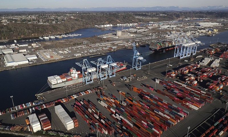 In this March 5, 2019, file photo, cargo containers are staged near cranes at the Port of Tacoma, in Tacoma, Wash. China has announced tariff hikes on $60 billion of U.S. goods in retaliation for President Donald Trump's escalation of a fight over technology and other trade disputes. The Finance Ministry said Monday, May 13, the penalty duties of 5% to 25% on hundreds of U.S. products including batteries, spinach and coffee take effect June 1. (AP Photo/Ted S. Warren, File)