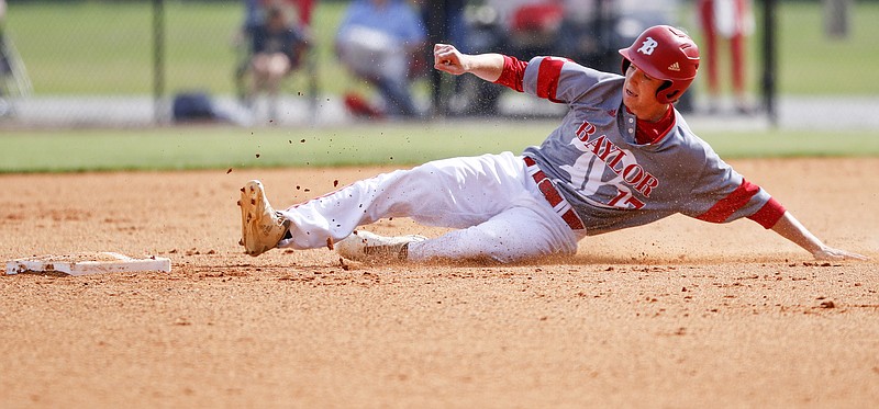Baylor's Ivan Reap slides into second base in the bottom of the first inning during the opening game of the Red Raiders' best-of-three Division II-AA quarterfinal series against Memphis University School on Wednesday. Baylor swept the doubleheader, 5-4 and 12-1, to continue its quest to repeat as state champion.