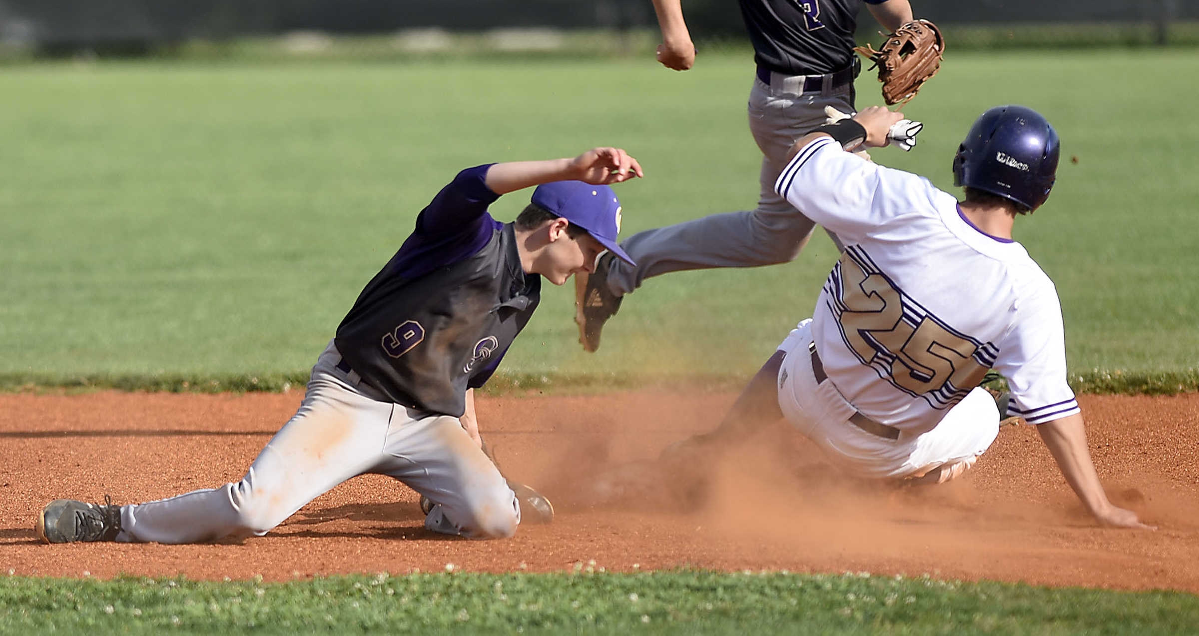Sequatchie County's Griffin Hall (25) is safe at second as he beats the tag of the Grundy Couny second baseman. The Sequatchie County Indians hosted the Grundy County Yellow Jackets in the Region 4-AA baseball championship on May 15, 2019.