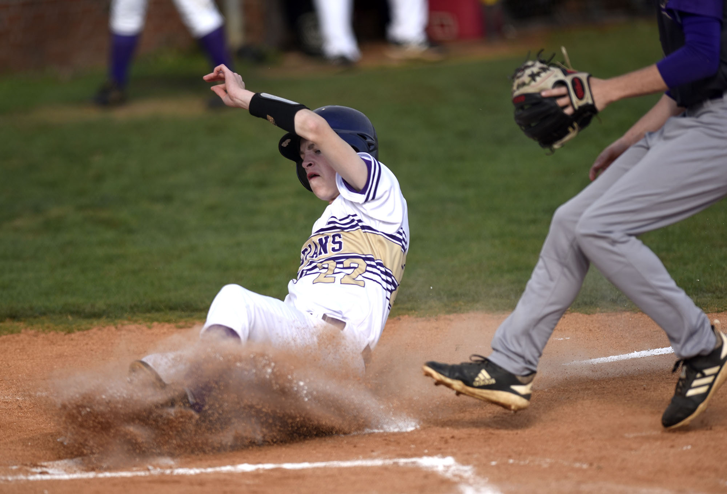 Sequatchie's Bodie Terry (22) beats the Grundy pitcher to the plate as Terry scores on a wild pitch. The Sequatchie County Indians hosted the Grundy County Yellow Jackets in the Region 4-AA baseball championship on May 15, 2019.