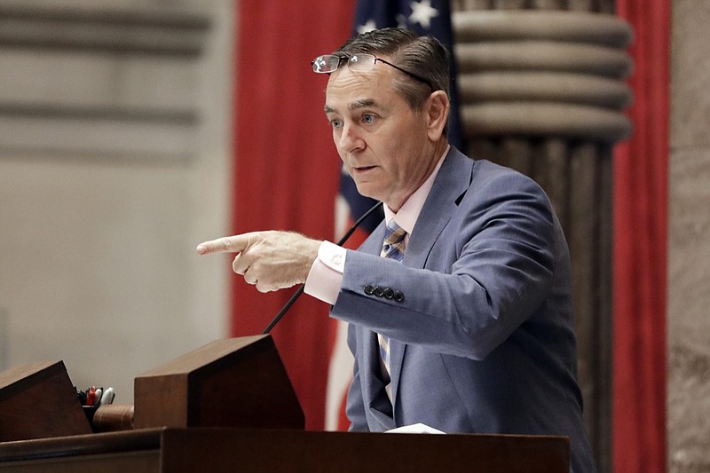 In this May 1, 2019, photo, House Speaker Glen Casada, R-Franklin, stands at the microphone during a House session in Nashville, Tenn. (AP Photo/Mark Humphrey)