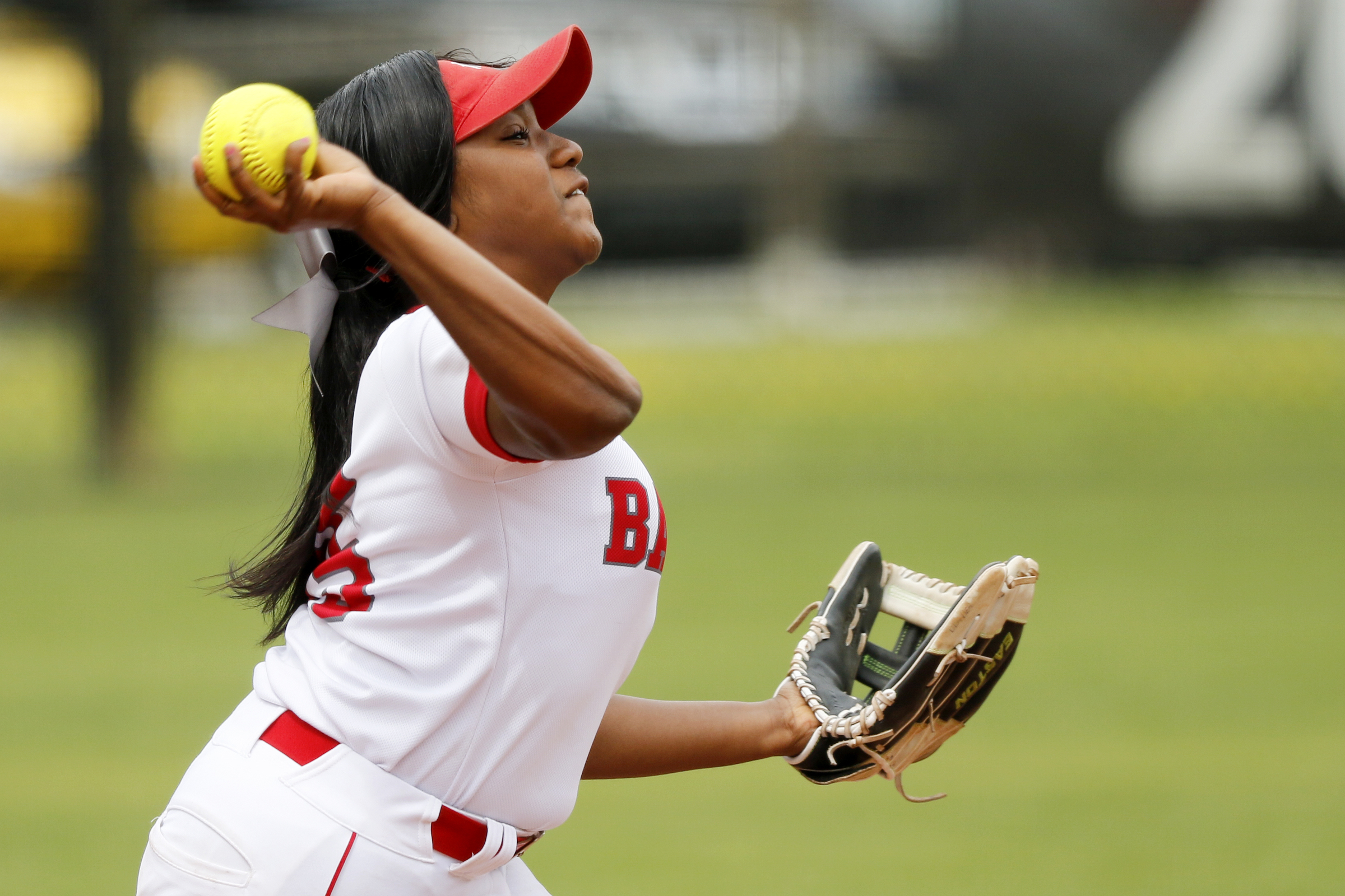 Baylor's CaDashia Collins (15) throws to first base for the second out of the top of the second inning during Game 1 of a doubleheader in the Division II-AA quarterfinals against St. Cecilia Academy at Baylor School on Wednesday, May 15, 2019 in Chattanooga, Tenn. Baylor won 16-0 in three innings.
