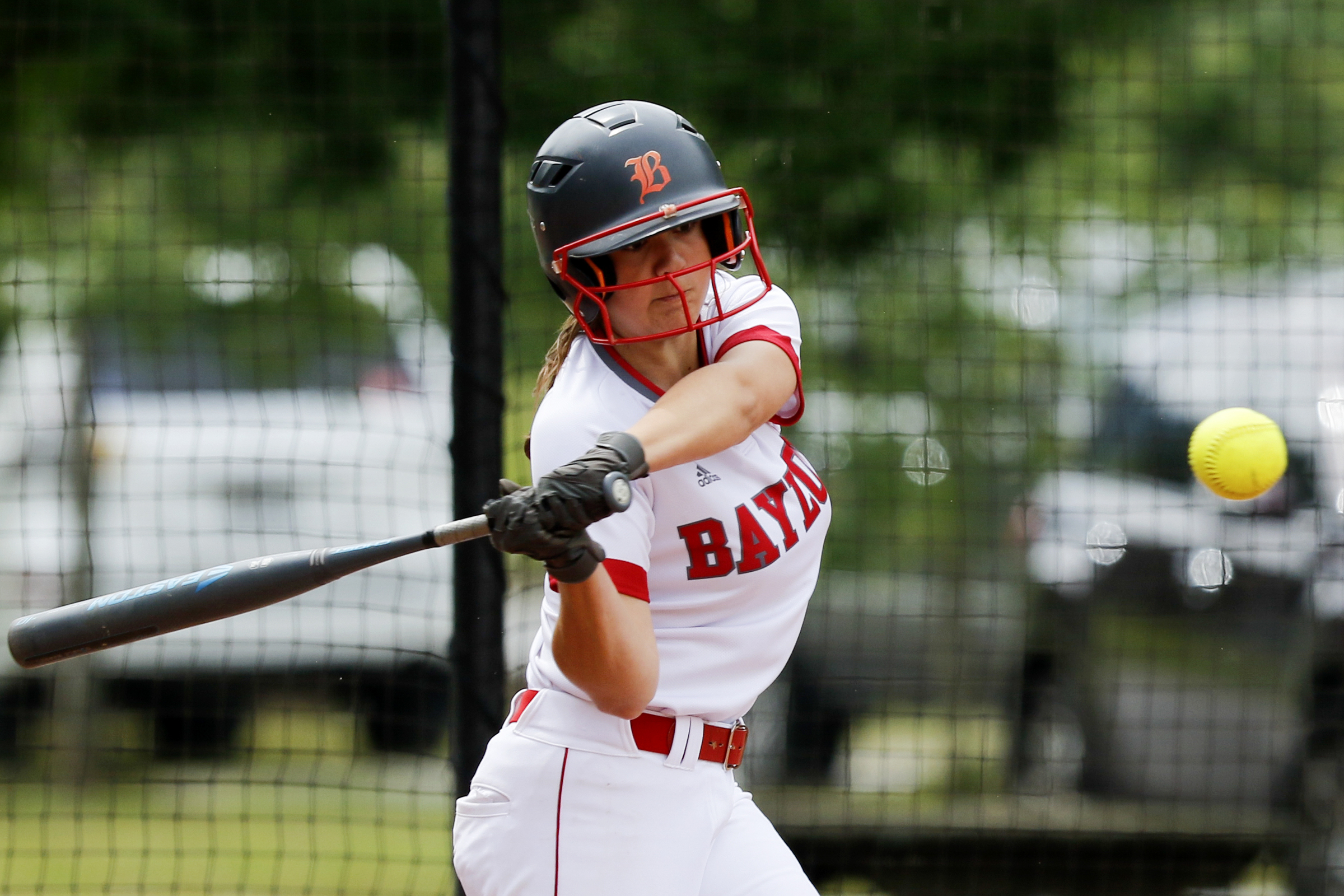 Baylor's Carrigan Pitts (18) hits a 1-run sacrifice fly in the bottom of the second inning during Game 1 of a doubleheader in the Division II-AA quarterfinals against St. Cecilia Academy at Baylor School on Wednesday, May 15, 2019 in Chattanooga, Tenn. Baylor won 16-0 in three innings.