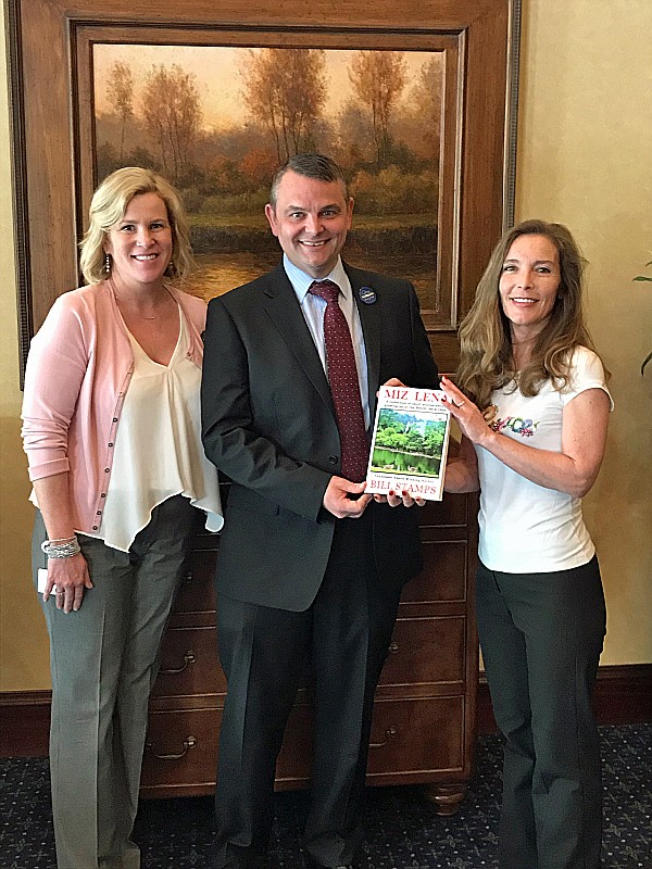 At the "Miz Lena" book presentation are, from left, Life Care Centers of America officials Jenny Graham, director of operations for Century Park Associates; and Ken Bolin, executive director of Garden Plaza, Cleveland; with Jana Stamps, wife of author Bill Stamps. / Photo by C.K. Phillips