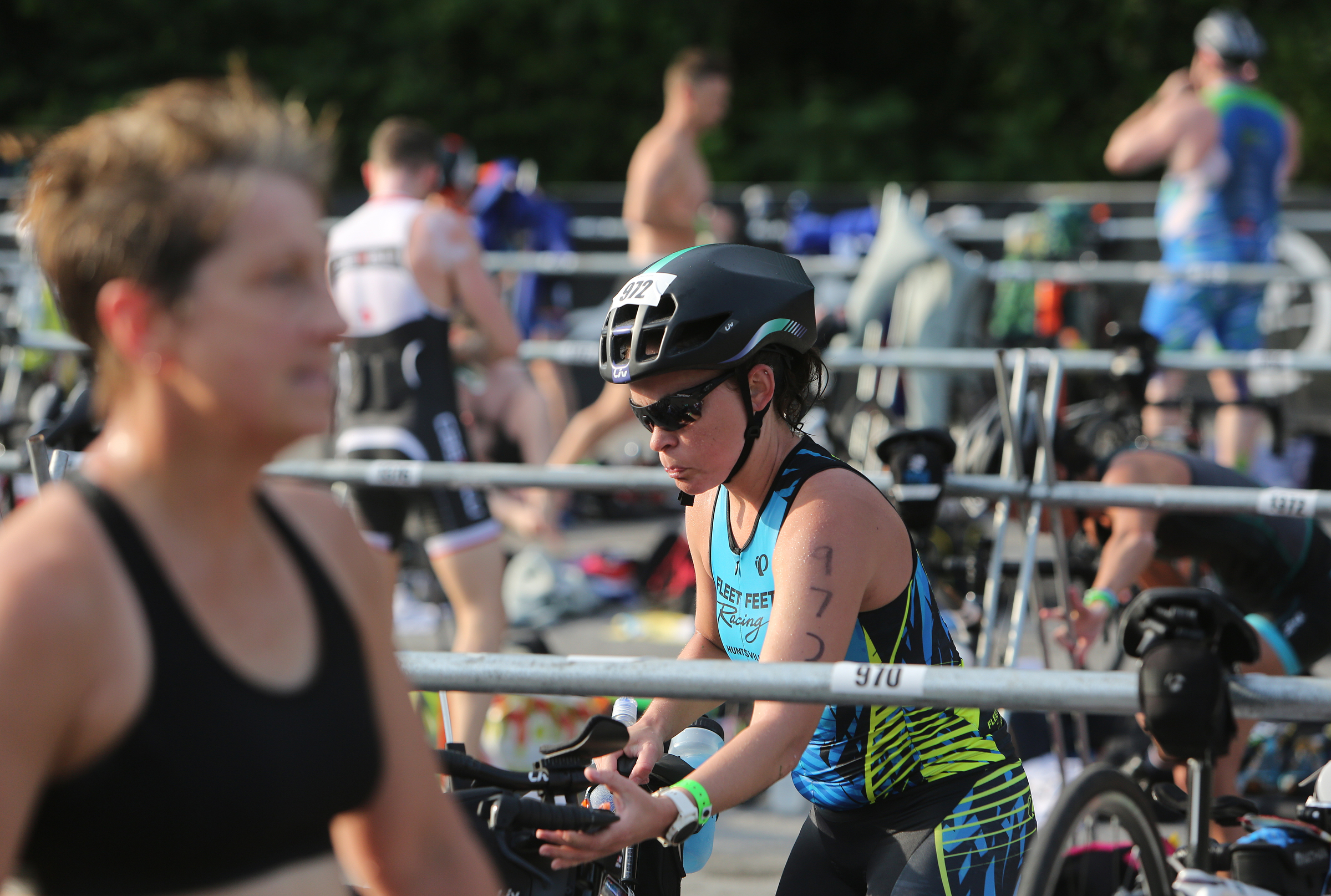 Ashley Benson pulls her bike off the rack during Ironman 70.3 Chattanooga Sunday, May 20, 2018 in Chattanooga, Tenn. More than 2,300 athletes participated in the event.