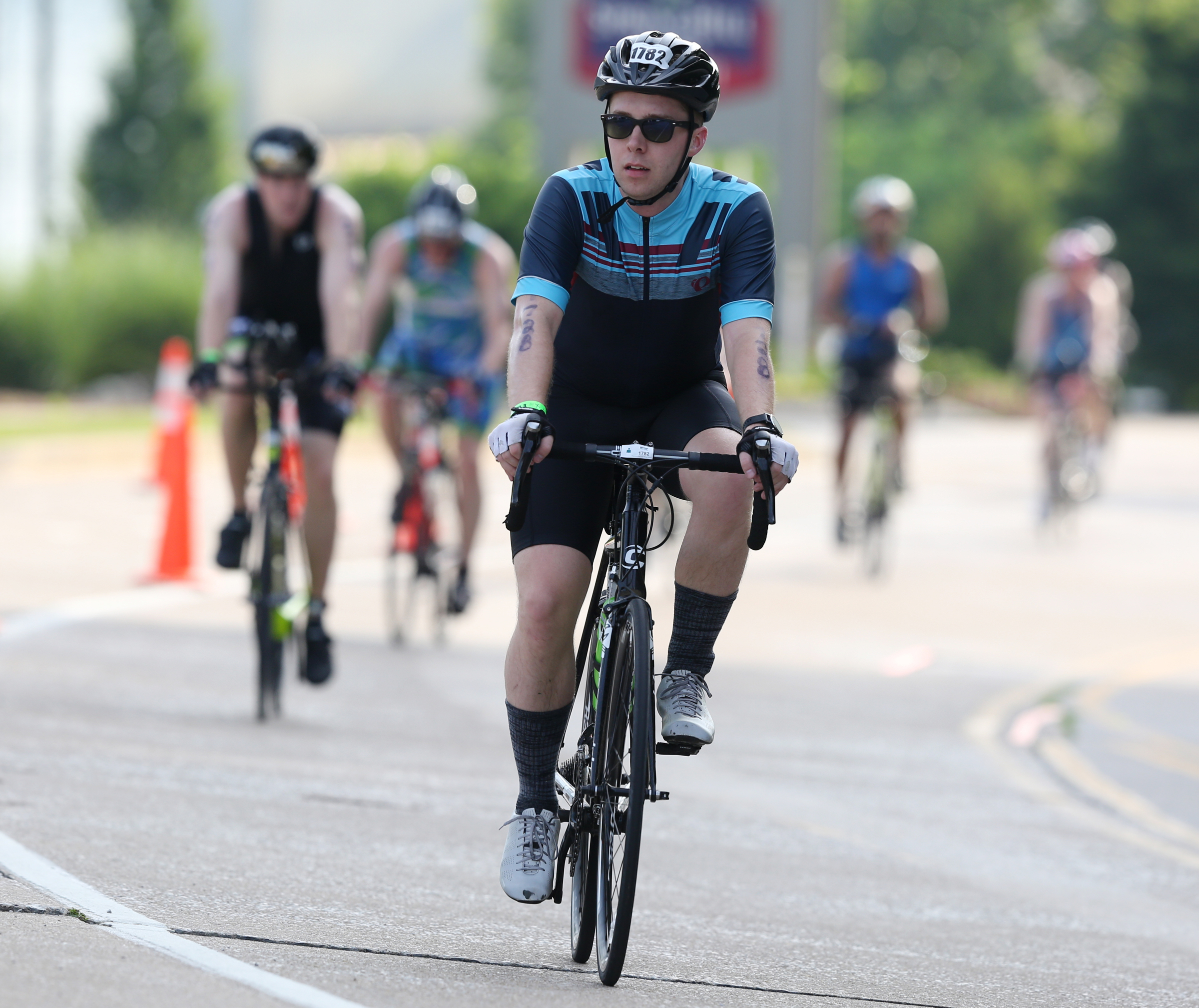 Tyler Curtis rides his bike up Riverfront Parkway during Ironman 70.3 Chattanooga Sunday, May 20, 2018 in Chattanooga, Tenn.