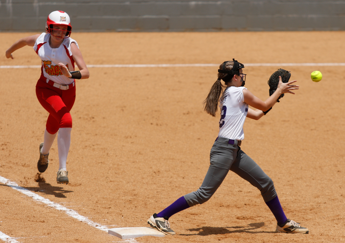 Marion County first baseman Bailey Davis forces Sequoyah runner Destiny Bowers out at first during their TSSAA softball game against Sequoyah at Marion County High School on Friday, May 17, 2019, in Chattanooga, Tenn.