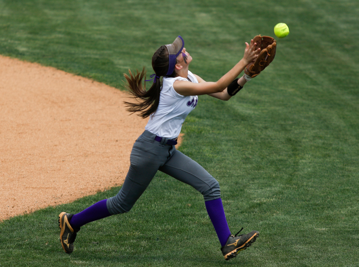 Marion County second baseman Grace Sneed can't quite reach a fly ball during their TSSAA softball game against Sequoyah at Marion County High School on Friday, May 17, 2019, in Chattanooga, Tenn.