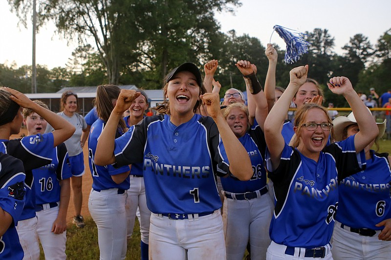 Sale Creek pitcher Macie Stanfield (1) and her teammates cheer after defeating Cosby 10-0 in five innings in a Class A state softball sectional on Friday. Stanfield threw a no-hitter.