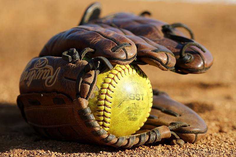 A softball rests in a glove on the field before a Class A state softball sectional game against Cosby at Sale Creek Middle/High School on Friday, May 17, 2019 in Sale Creek, Tenn.