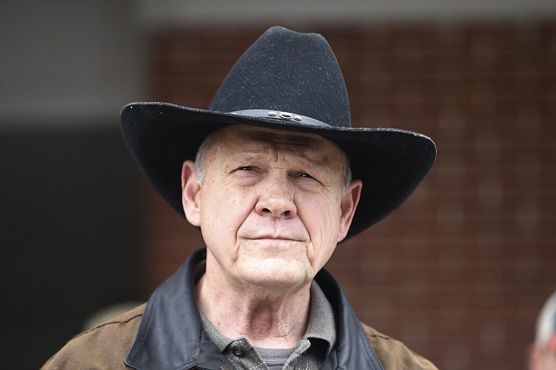 FILE - In this Dec. 12, 2017, file photo, Roy Moore speaks to the media after he rode in on a horse to vote in Gallant, Ala. Moore says he s considering a fresh run for Senate in 2020. That s prompting national Republican leaders to signal that they d try again to prevent their party from nominating Moore, who s denied long-ago sexual impropriety with teenagers. (AP Photo/Brynn Anderson, File)

