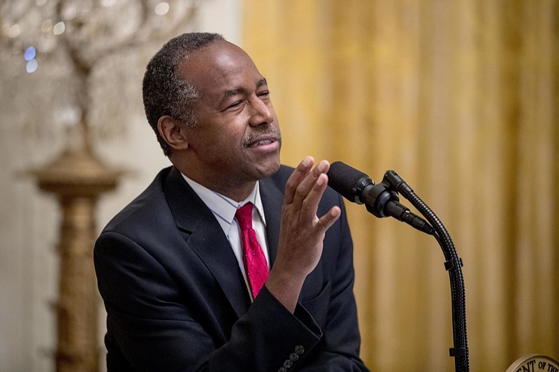 FILE - In this Oct. 26, 2018, file photo, Housing and Urban Development Secretary Ben Carson speaks to the audience before President Donald Trump speaks at the 2018 Young Black Leadership Summit in the East Room of the White House in Washington. Government auditors say Carson violated the law when his department spent more than $40,000 to purchase a dining set and a dishwasher for his office s executive dining room. In a report released May 16, 2019, the Government Accountability Office says the agency failed to notify Congress before exceeding a $5,000 limit to furnish or make improvements to the office of a presidential appointee. The dining set cost more than $31,000 and the dishwasher cost nearly $9,000. (AP Photo/Andrew Harnik, File)

