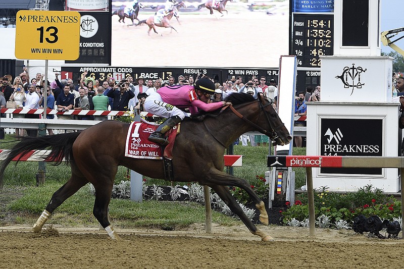 War of Will, ridden by Tyler Gaffalione, crosses the finish line to win the Preakness Stakes on Saturday at Pimlico Race Course in Baltimore. Everfast finished second and Owendale was third.