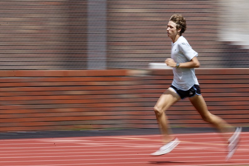 Cole Bullock runs 1200 meters while practicing at Red Bank Community Stadium on Monday, May 13, 2019 in Red Bank, Tenn.