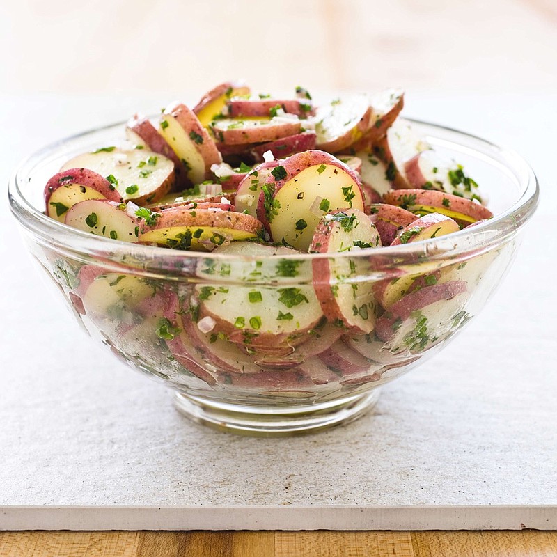 This undated photo provided by America's Test Kitchen in April 2019 shows a French Potato Salad with Dijon in Brookline, Mass. This recipe appears in the cookbook "Revolutionary Recipes." (Carl Tremblay/America's Test Kitchen via AP)

