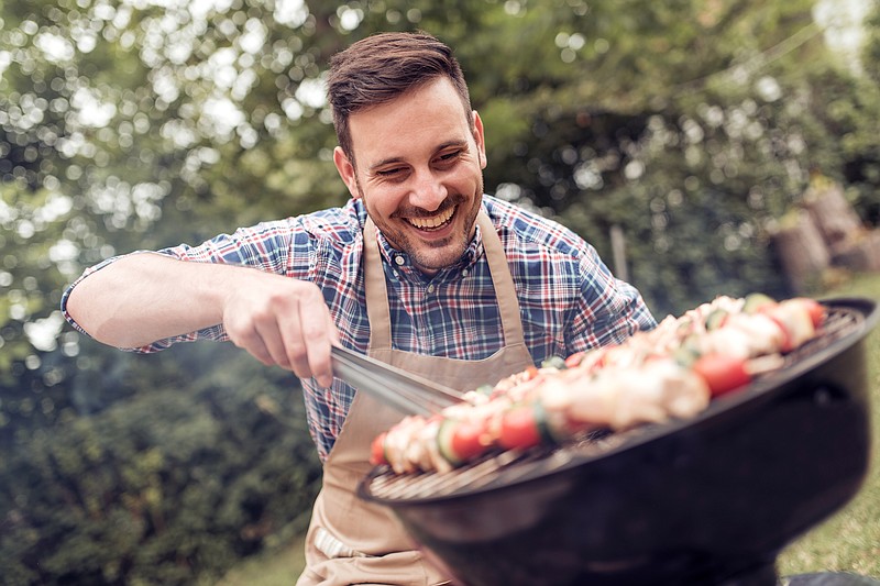 There's nothing more manly than slapping a juicy slab of meat onto a charcoal grill and listening as it sizzles to perfection. But mouthwatering burgers and world-class ribs aren't the only ways to impress when you fire up your grill. / Getty Images/iStockphoto/Ivanko_Brnjakovic