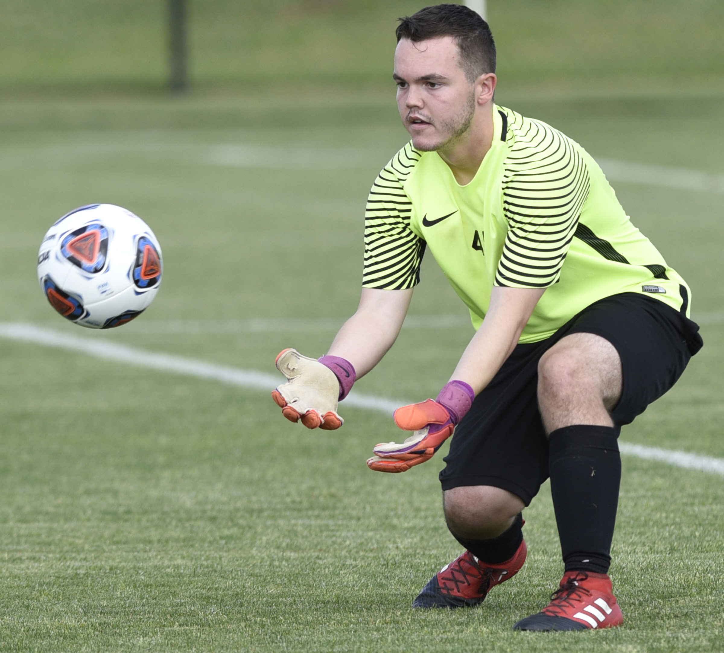 CSAS goalkeeper Fisher Latham gathers in a shot during the Patriots' match against Madison Magnet in the opening round of the TSSAA Class A soccer state tournament Tuesday at the Richard Siegel Soccer Complex in Murfreesboro.
