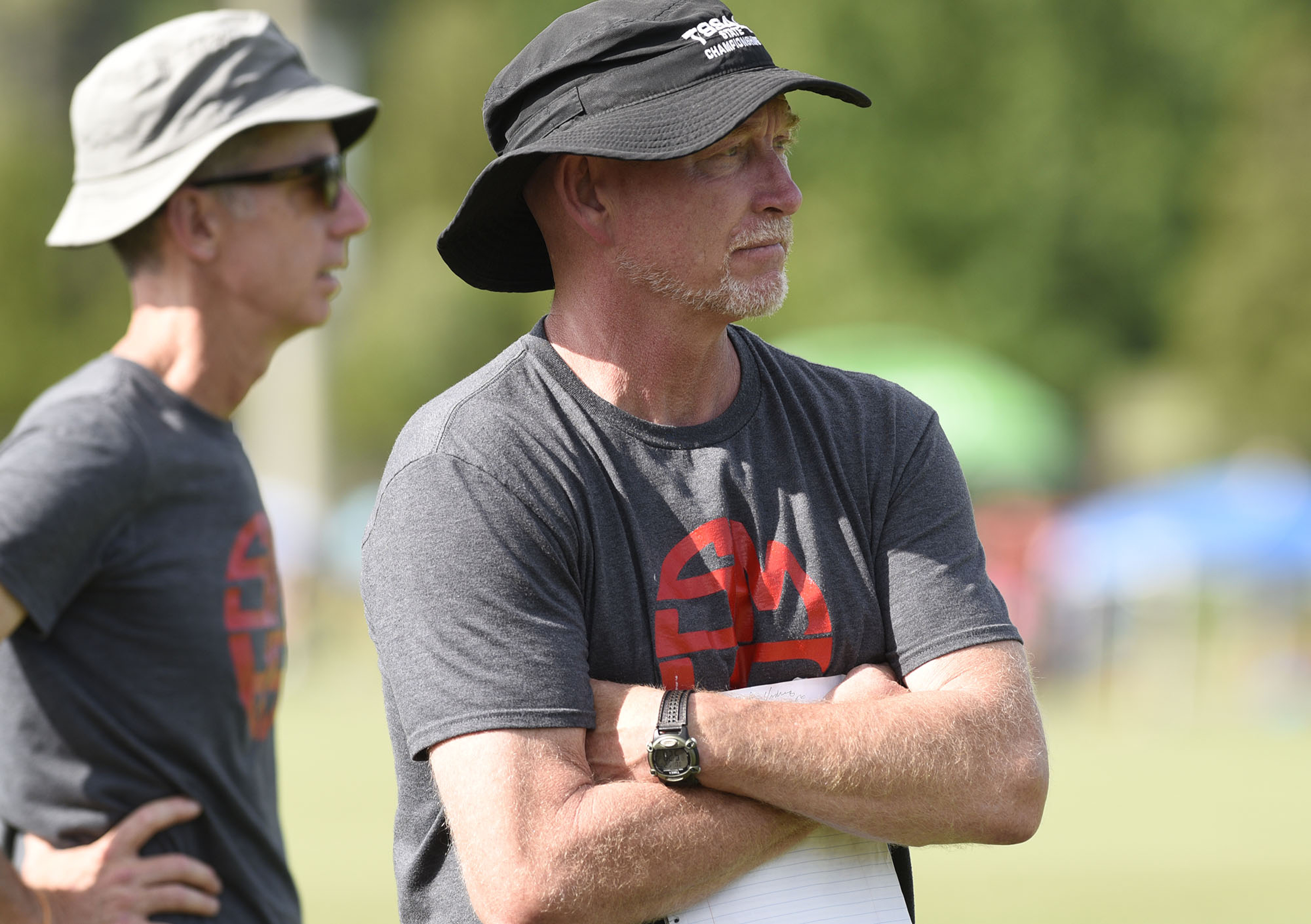 Signal Mountain head coach Richard Northcutt, left, watches the action. The TSSAA Class A Soccer Tournament was held at Siegel Park in Murfreesboro on May 21, 2019.