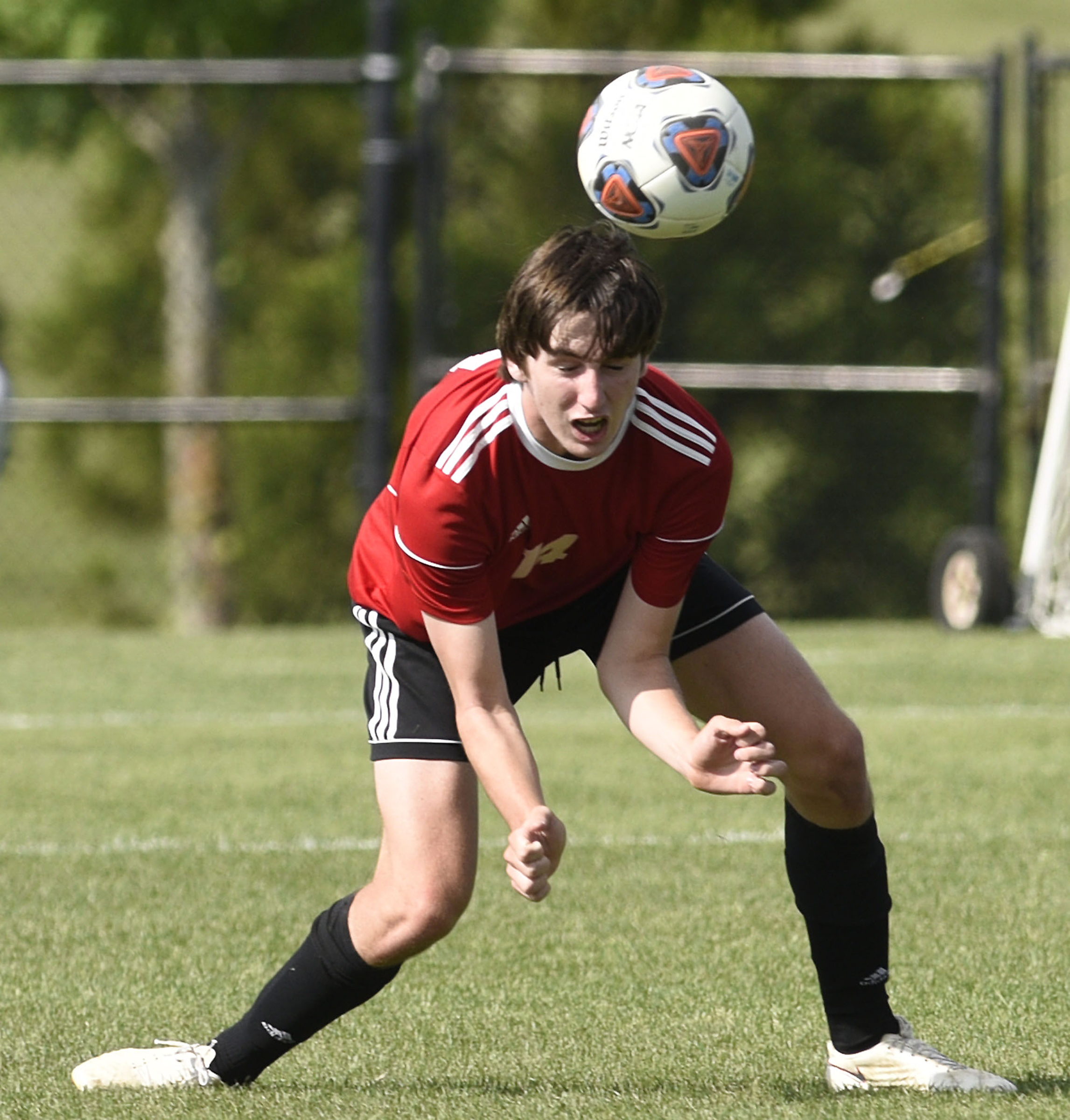 Signal Mountain's Keeling Kennedy (14) makes a low header. The TSSAA Class A Soccer Tournament was held at Siegel Park in Murfreesboro on May 21, 2019.