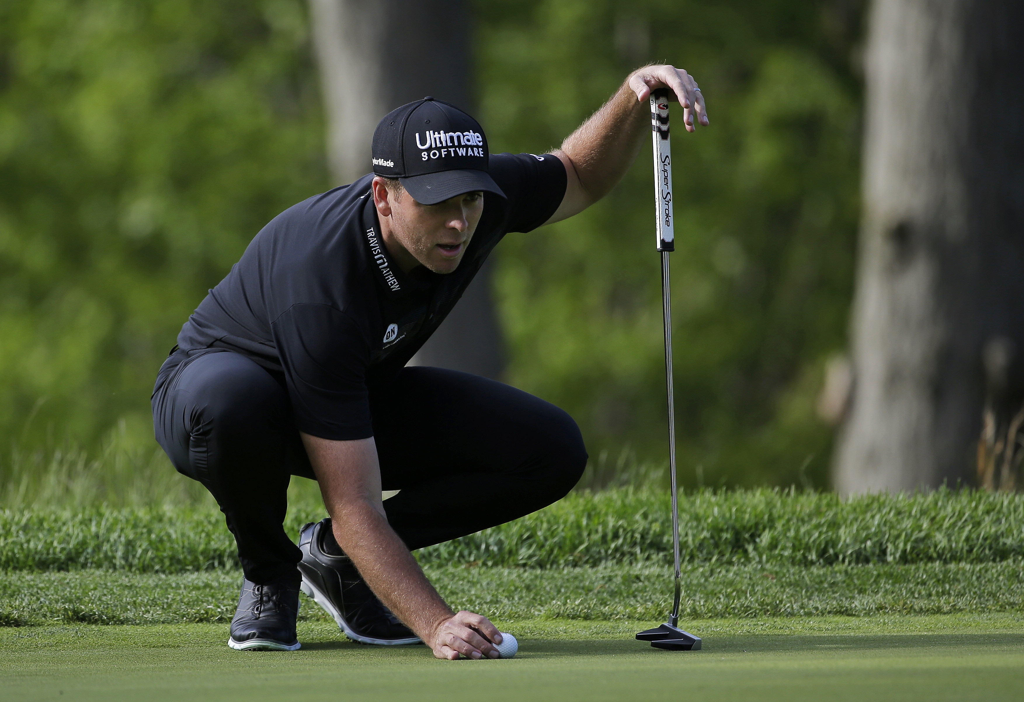Luke List lines up a putt on the 14th green during the third round of the PGA Championship golf tournament, Saturday, May 18, 2019, at Bethpage Black in Farmingdale, N.Y. (AP Photo/Seth Wenig)