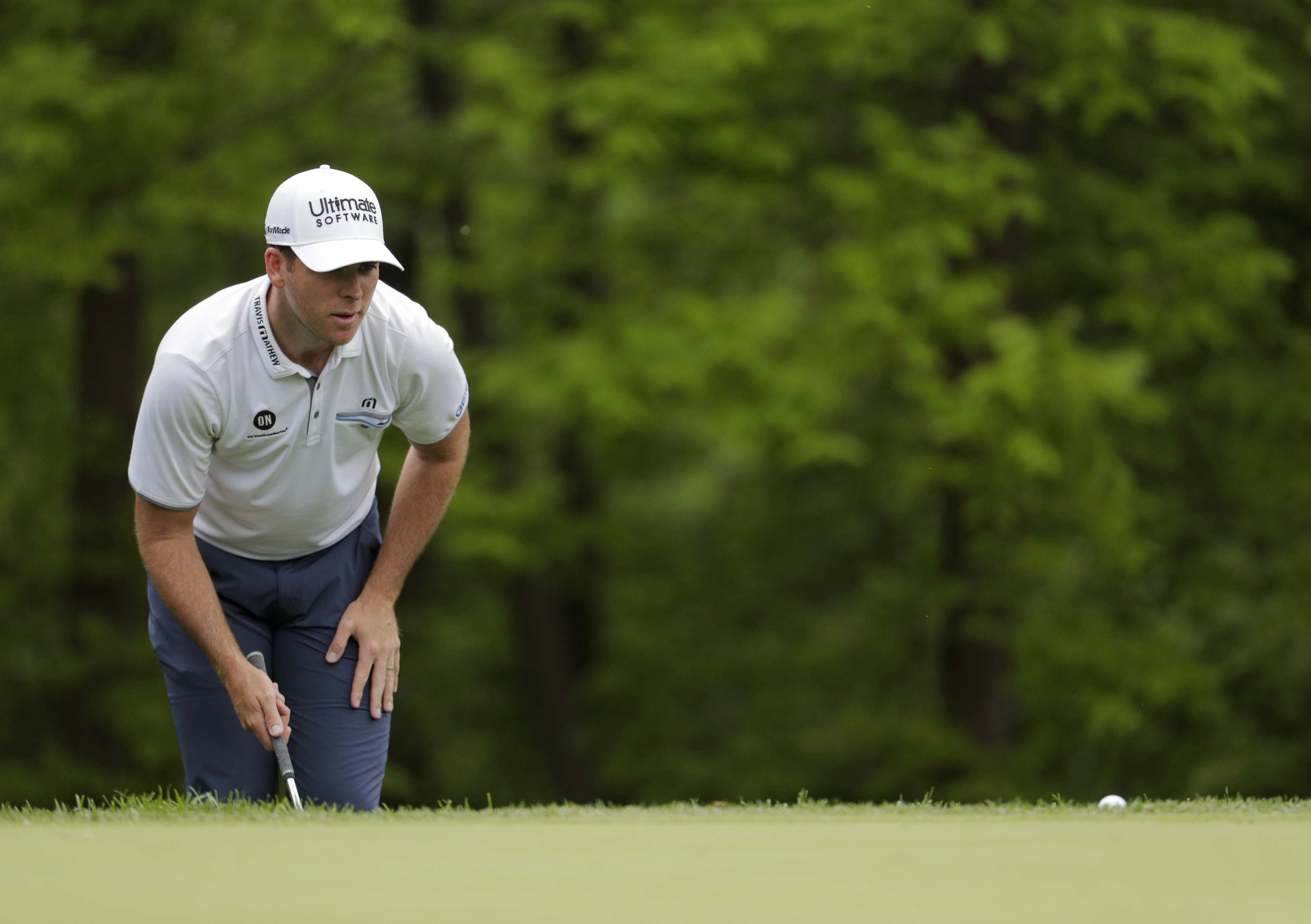 Luke List lines up a putt on the third green during the final round of the PGA Championship golf tournament, Sunday, May 19, 2019, at Bethpage Black in Farmingdale, N.Y. (AP Photo/Julio Cortez)
